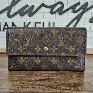Authentic Louis Vuitton Monogram Sarah Wallet